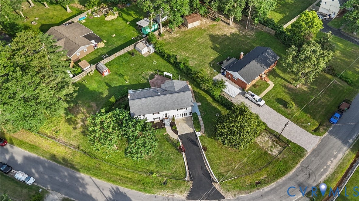 4911 Aqua Lane, Prince George, VA 23875 Expansive parcel featuring multiple residential structures and mature trees