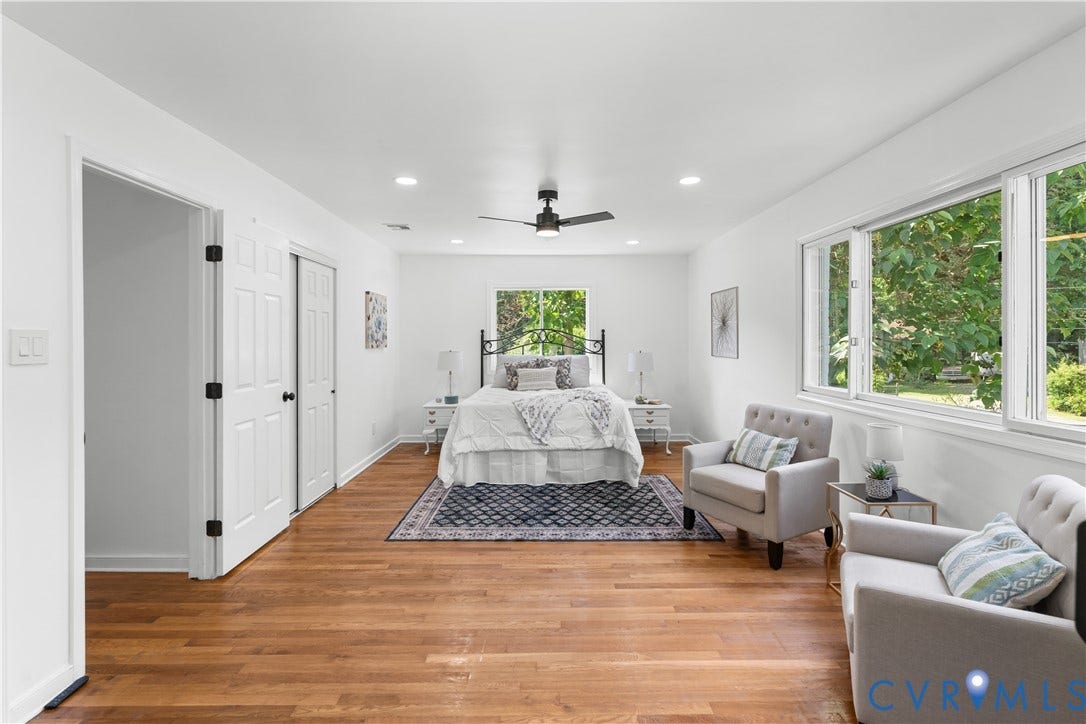 4911 Aqua Lane, Prince George, VA 23875 Recessed lighting, wood-finish flooring, white paneled doors, and multiple windows