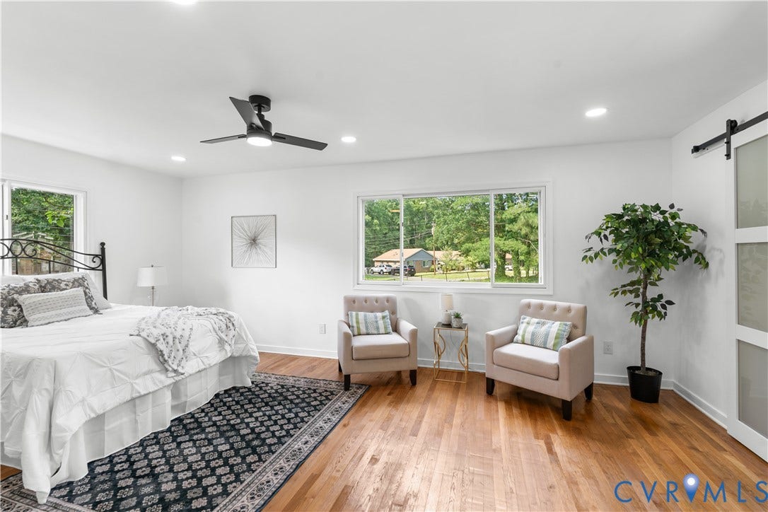 4911 Aqua Lane, Prince George, VA 23875 Recessed lighting, wood-finish flooring, multiple windows, ceiling fan, and barn door entry
