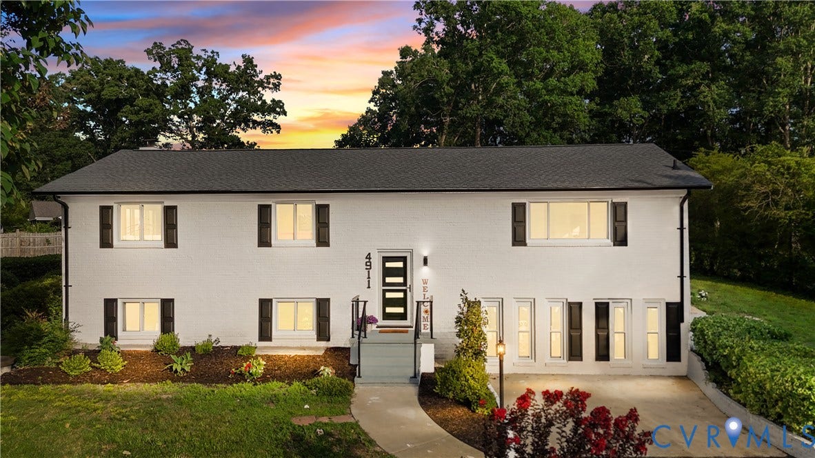 4911 Aqua Lane, Prince George, VA 23875 White exterior with dark shutters, dark roof, front entry stairs, and front landscaping