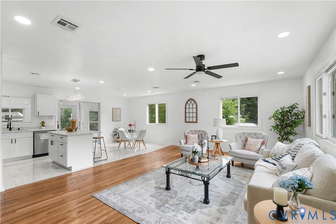 4911 Aqua Lane, Prince George, VA 23875 Open concept living area with recessed lighting, wood-finish flooring, and a modern ceiling fan