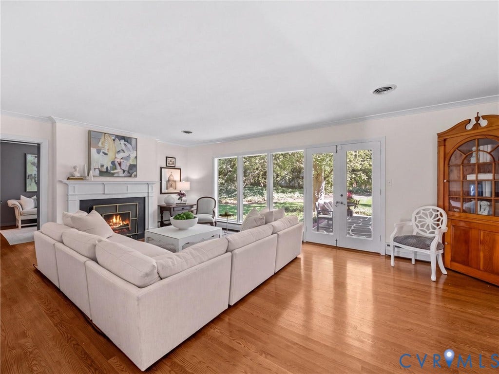 6208 Tapoan Place, Three Chopt, Richmond, VA 23226 Hardwood flooring, white crown molding, fireplace with white mantel, French doors, and ample natural light