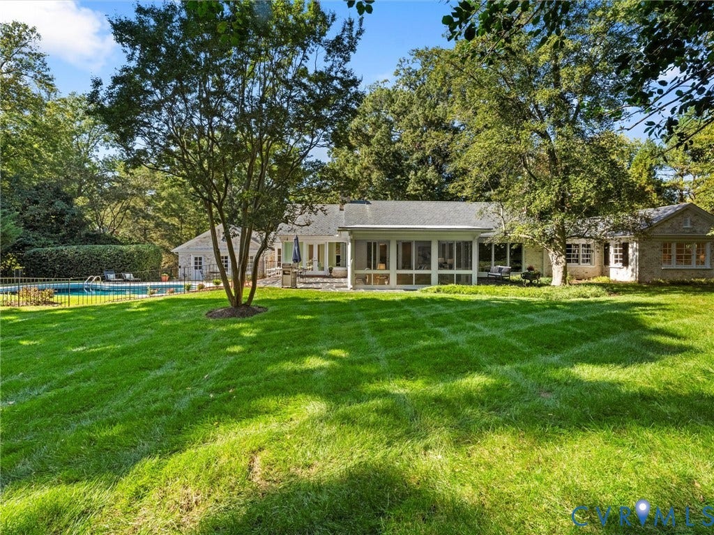 6208 Tapoan Place, Three Chopt, Richmond, VA 23226 Expansive grounds featuring manicured lawn, mature shade trees, and a screened-in porch with multiple French doors