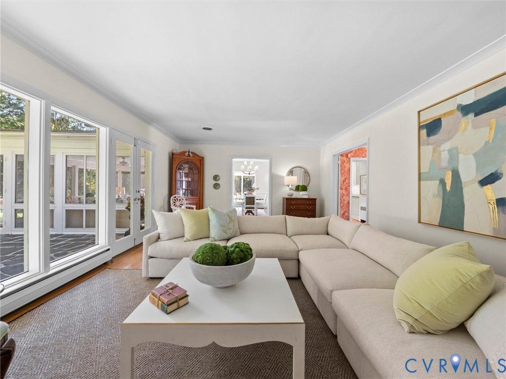 6208 Tapoan Place, Three Chopt, Richmond, VA 23226 Expansive living area with large windows, double glass doors, crown molding, and wood-finish flooring