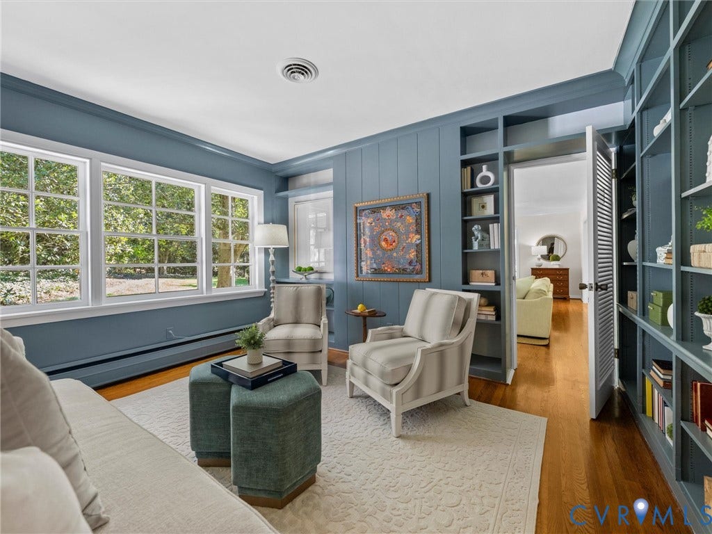 6208 Tapoan Place, Three Chopt, Richmond, VA 23226 Paneled walls, wood-finish flooring, built-in shelving, and large multi-pane windows
