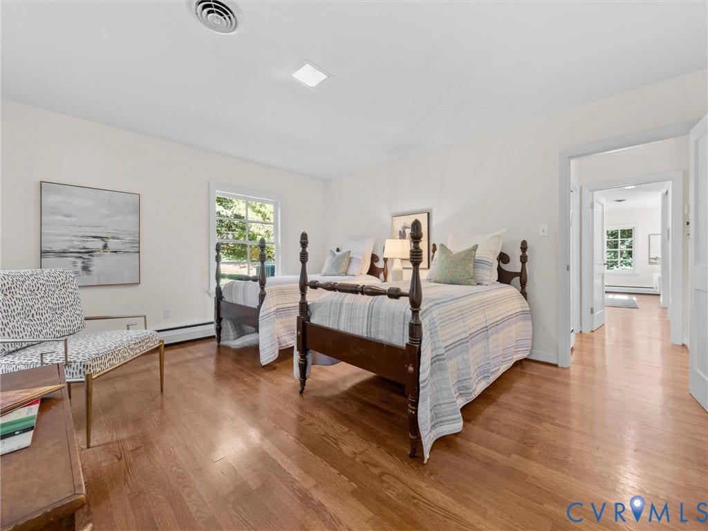 6208 Tapoan Place, Three Chopt, Richmond, VA 23226 Hardwood flooring, white walls, built-in ceiling lighting, and a large window