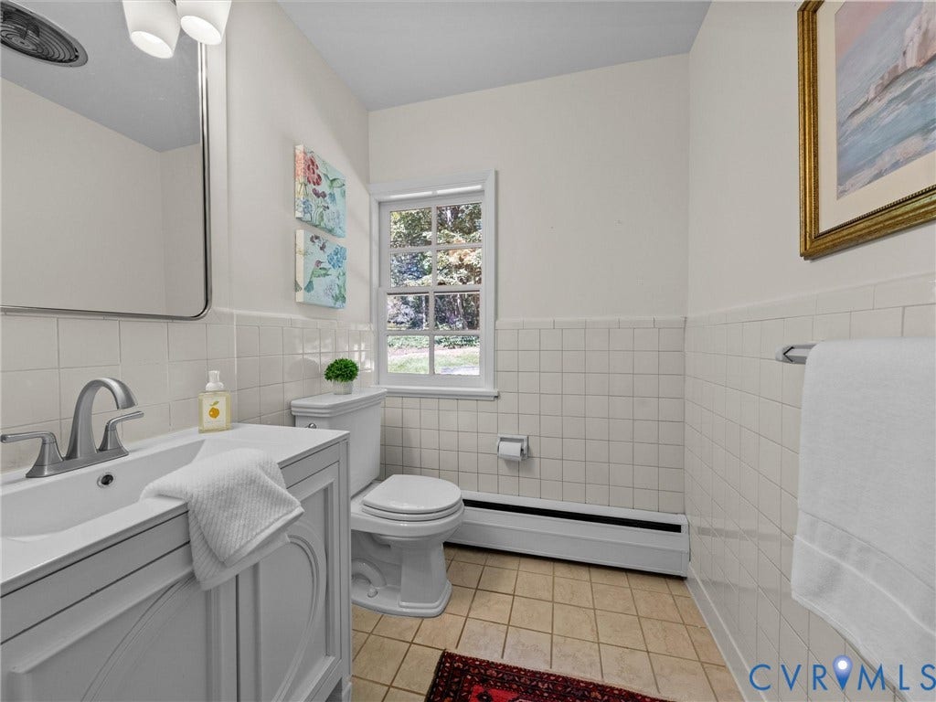 6208 Tapoan Place, Three Chopt, Richmond, VA 23226 Vanity with an integrated sink, tile flooring, and white square wall tiling
