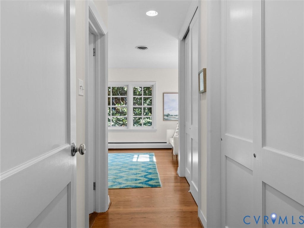 6208 Tapoan Place, Three Chopt, Richmond, VA 23226 Hardwood flooring, recessed lighting, white doors, white trim, and a window with exterior tree foliage