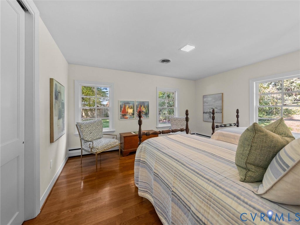 6208 Tapoan Place, Three Chopt, Richmond, VA 23226 Hardwood-finish flooring, recessed lighting, and multiple windows with white trim