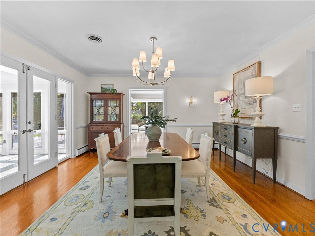 6208 Tapoan Place, Three Chopt, Richmond, VA 23226 Hardwood flooring, crown molding, double French doors, and an elegant chandelier