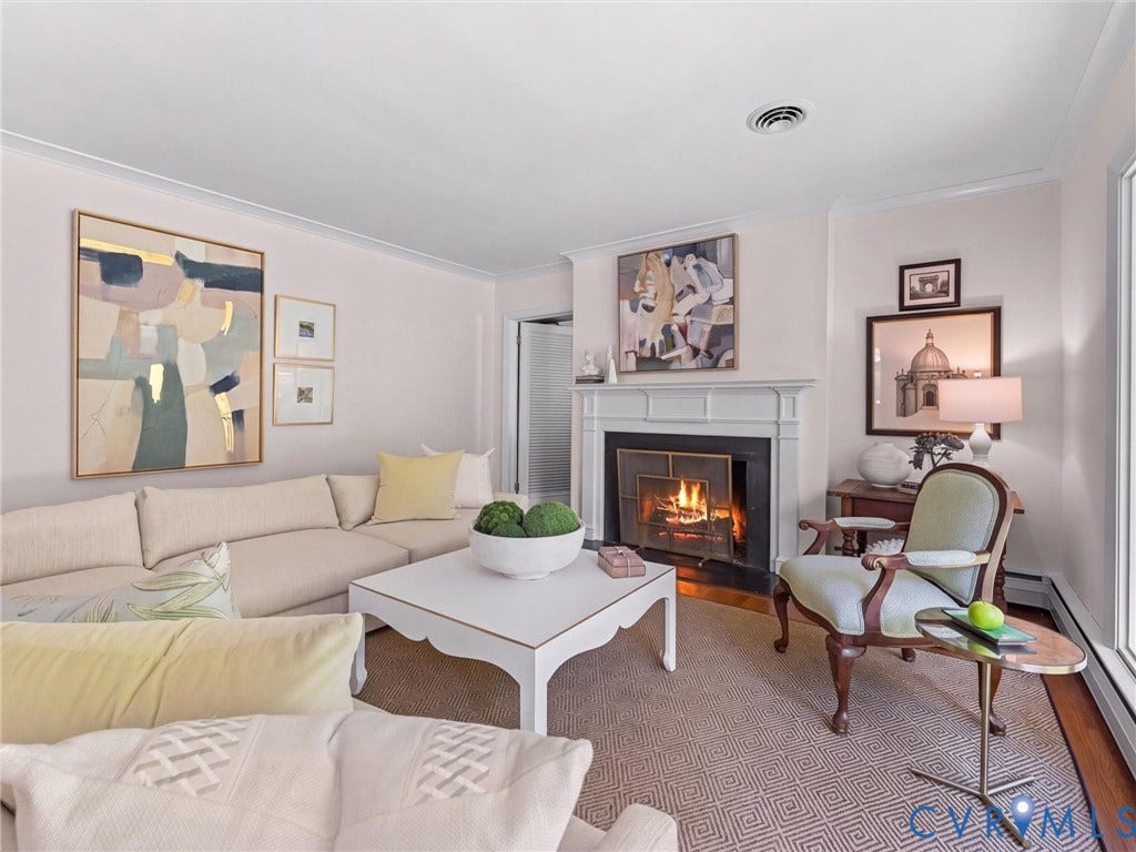 6208 Tapoan Place, Three Chopt, Richmond, VA 23226 Hardwood flooring, crown molding, white fireplace with hearth, and ample natural light
