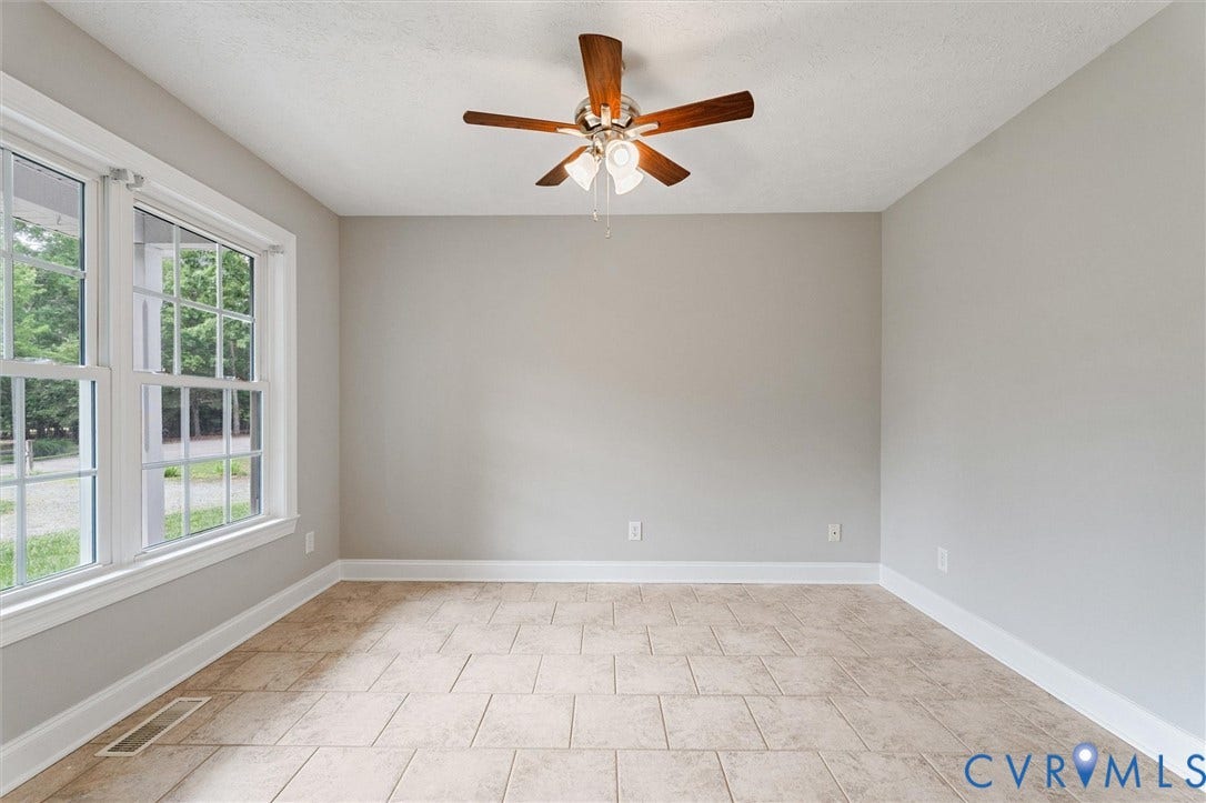 Recessed lighting, ceiling fan with light fixture, large windows, tiled flooring, light wall color