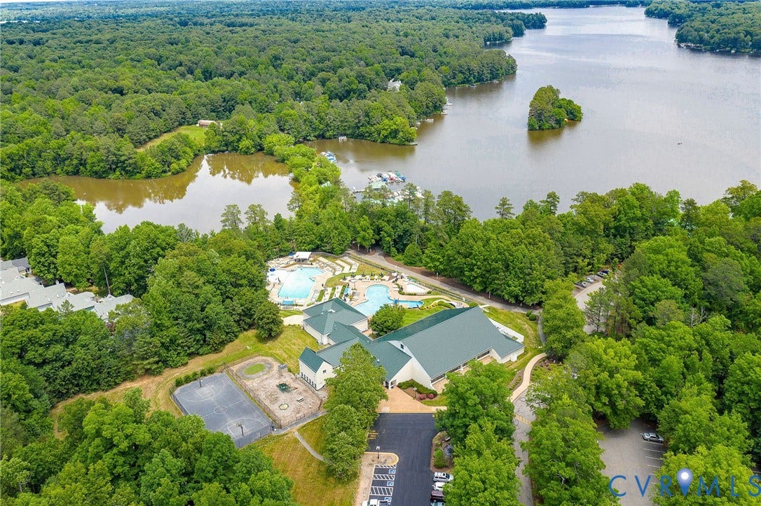 Woodlake Community amenities include indoor and outdoor pools, along the Swift Creek Reservoir -14 miles of walking trails.