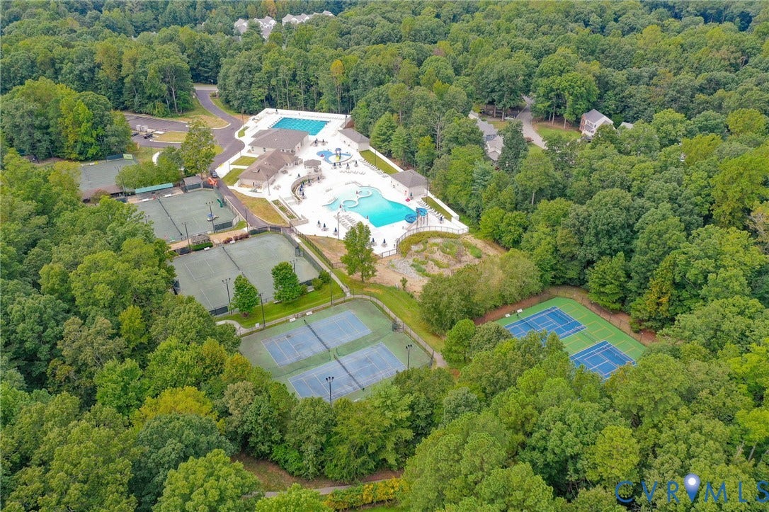 The Woodlake Aquatic & Fitness Center (AFC) and Swim & Racquetball Court (SRC) include an indoor pool, outdoor pools, a fitness center