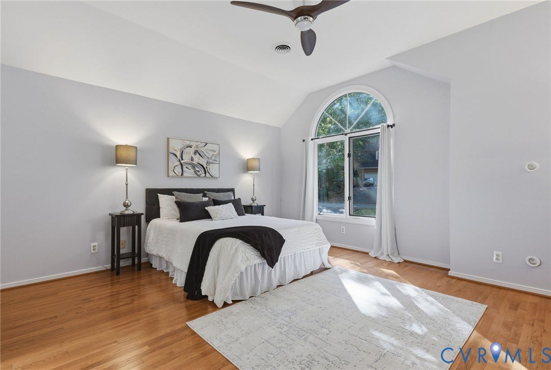 Spacious primary suite with huge walk in closet