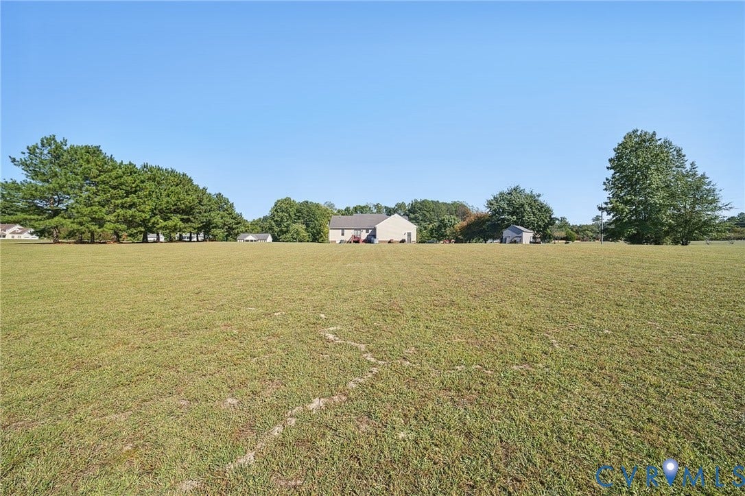 20550 Horseshoe Road, Prince George, VA 23830 Expansive green lawn with mature trees and visible outbuilding