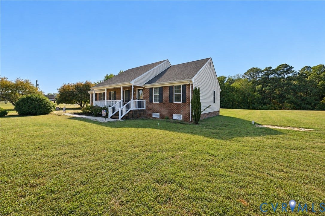 20550 Horseshoe Road, Prince George, VA 23830 Brick and siding exterior with a covered front porch featuring white railings