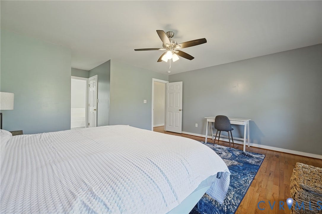 20550 Horseshoe Road, Prince George, VA 23830 Hardwood flooring, painted walls, ceiling fan with integrated lighting, and white trim