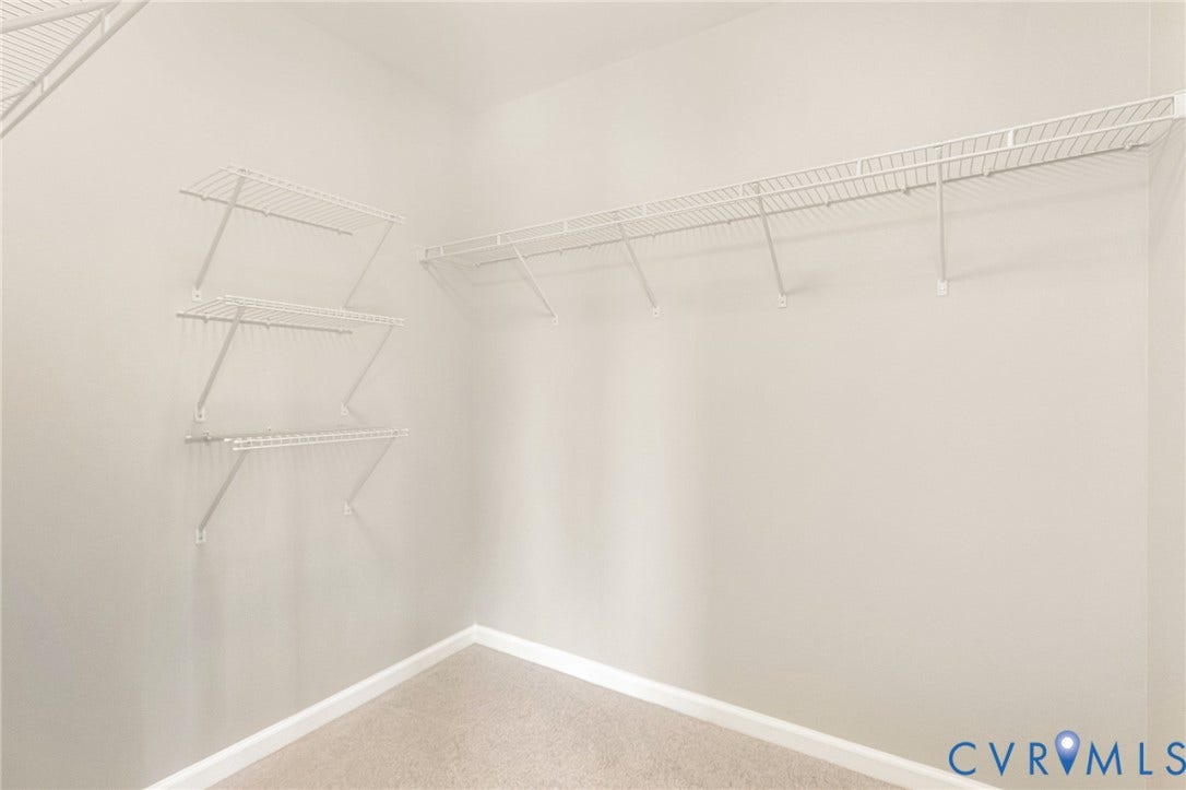 8926 Ringview Drive, Mechanicsville, VA 23116 Built-in wire shelving, wall-mounted wire racks, and neutral wall paint