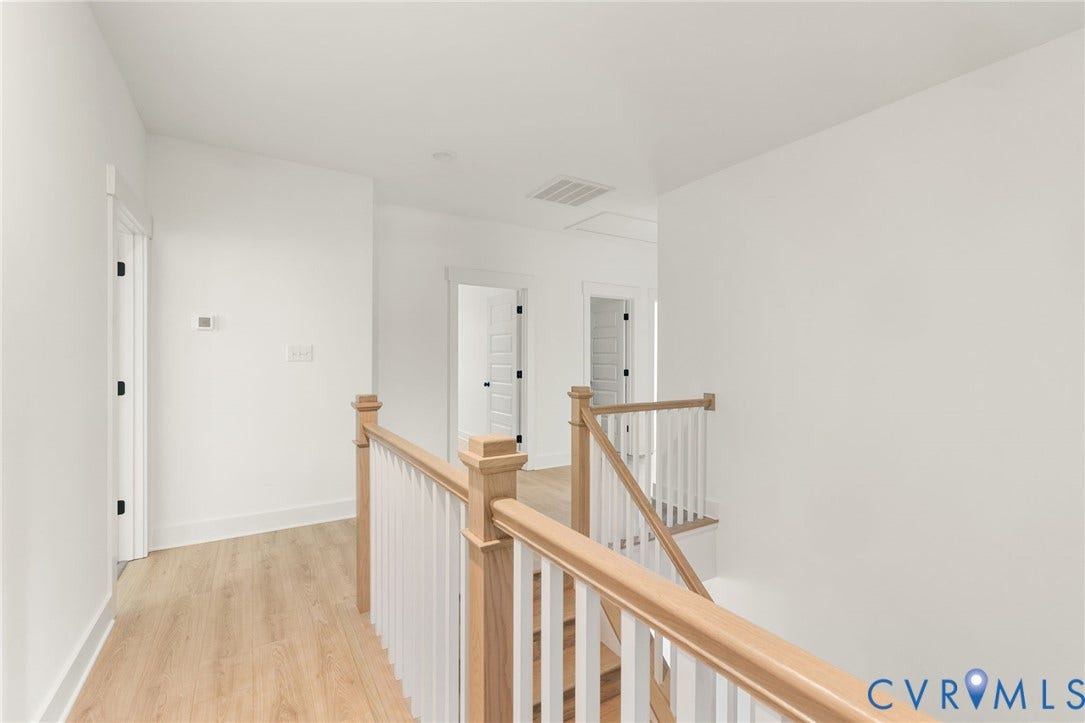 9514 Angels Share Drive, New Kent, VA 23141 Light wood-finish flooring extending through the hallway