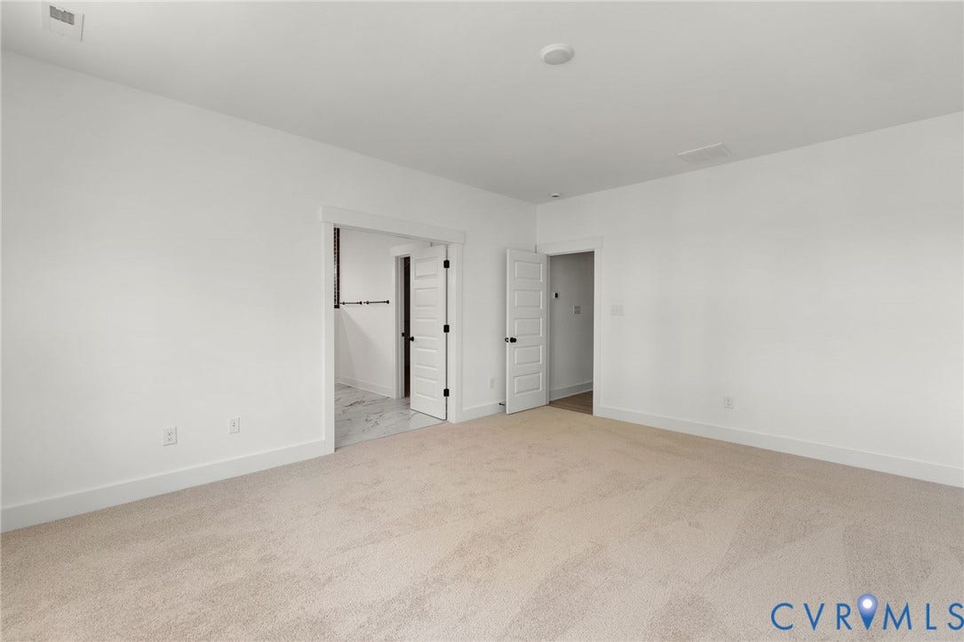 9514 Angels Share Drive, New Kent, VA 23141 White walls with light-colored carpeting