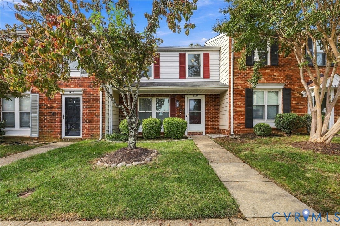8434 Shannon Green Court, Henrico, VA 23228 Brick and siding exterior with red and black window shutters