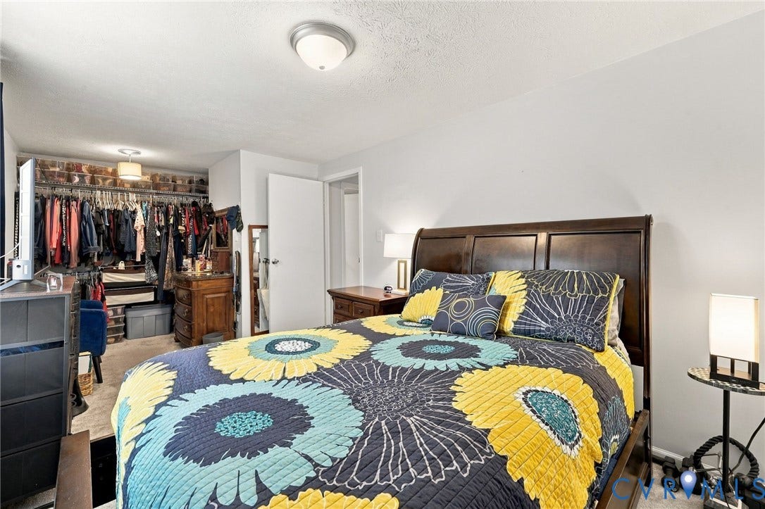8434 Shannon Green Court, Henrico, VA 23228 Recessed overhead lighting, textured ceiling, and neutral wall paint