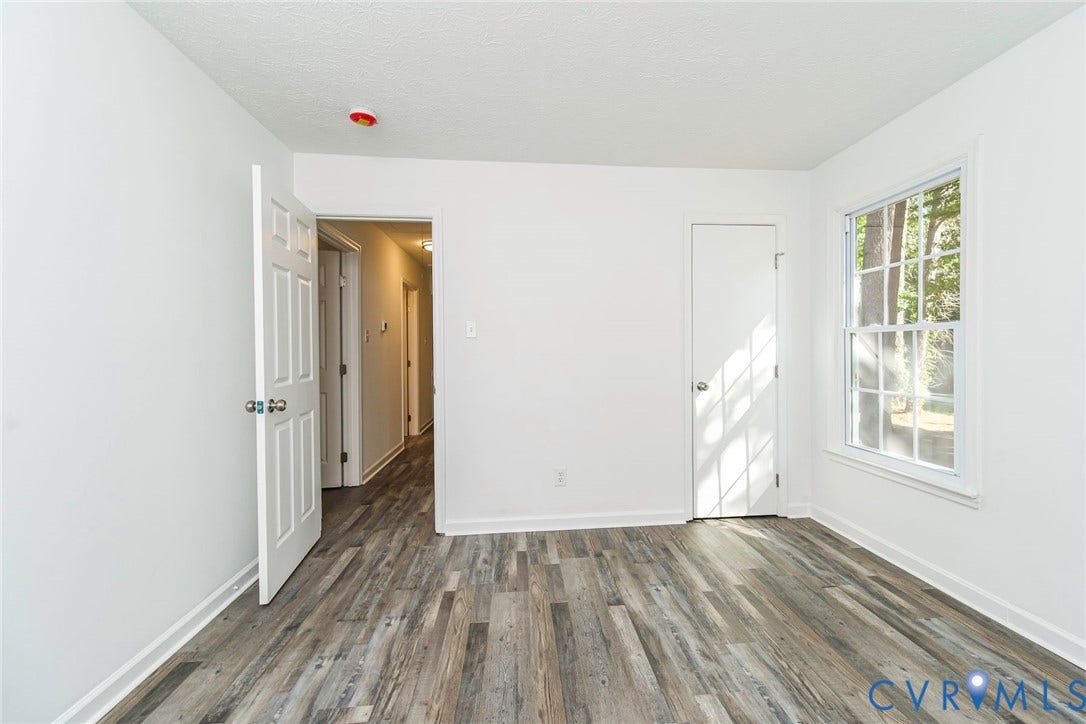 21108 Matoaca Road, Chesterfield, VA 23803 Wood-finish flooring with crisp white walls and white trim