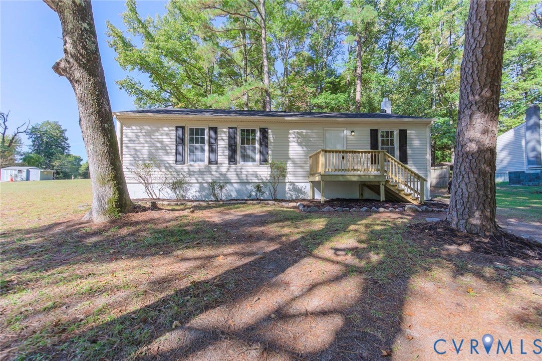 21108 Matoaca Road, Chesterfield, VA 23803 White vinyl siding exterior with dark shutters