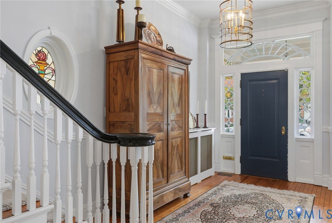 2624 Park Avenue, The Fan District, Richmond, VA 23220 Hardwood flooring, classic staircase with white balusters, stained-glass circular window, sidelights either side of the door and transom window above the door