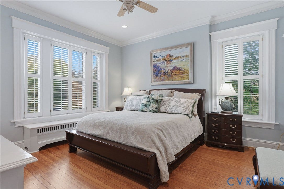 2624 Park Avenue, The Fan District, Richmond, VA 23220 Hardwood flooring, crown molding, a ceiling fan, recessed lighting, and white plantation shutters