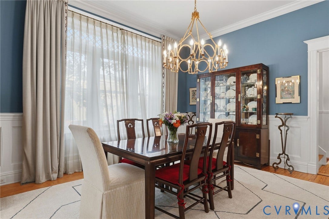2624 Park Avenue, The Fan District, Richmond, VA 23220 Formal dining area featuring a prominent chandelier, tall windows including pocket doors to the living room