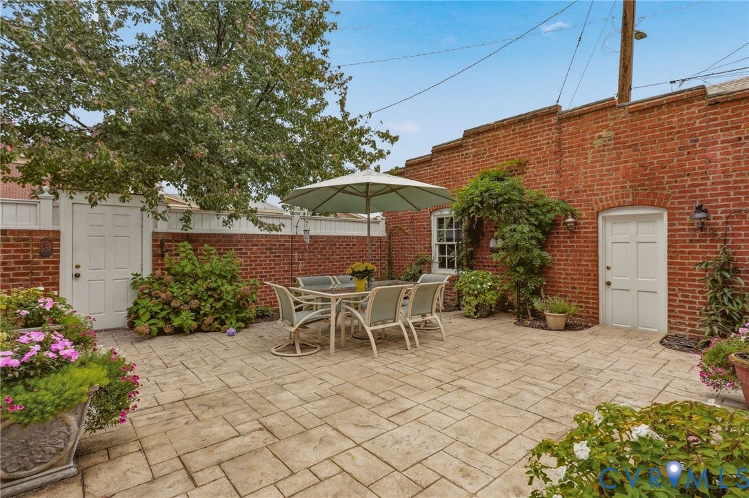 2624 Park Avenue, The Fan District, Richmond, VA 23220 Stunning brick exterior stamped concrete patio, lush landscaping, door to garage