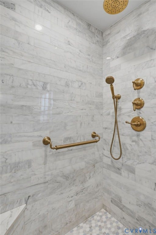 2624 Park Avenue, The Fan District, Richmond, VA 23220 Shower enclosure featuring quartz tile walls, a built-in shower bench