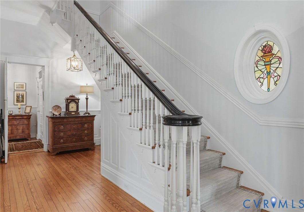 2624 Park Avenue, The Fan District, Richmond, VA 23220 Hardwood flooring, painted white wainscoting, circular stained glass window