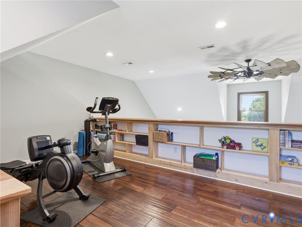 16233 Pleasant Mill Road, Montpelier, VA 23192 Finished room with wood-finish flooring, custom built-in low-profile shelving, recessed lighting, and an oversized decorative ceiling fan