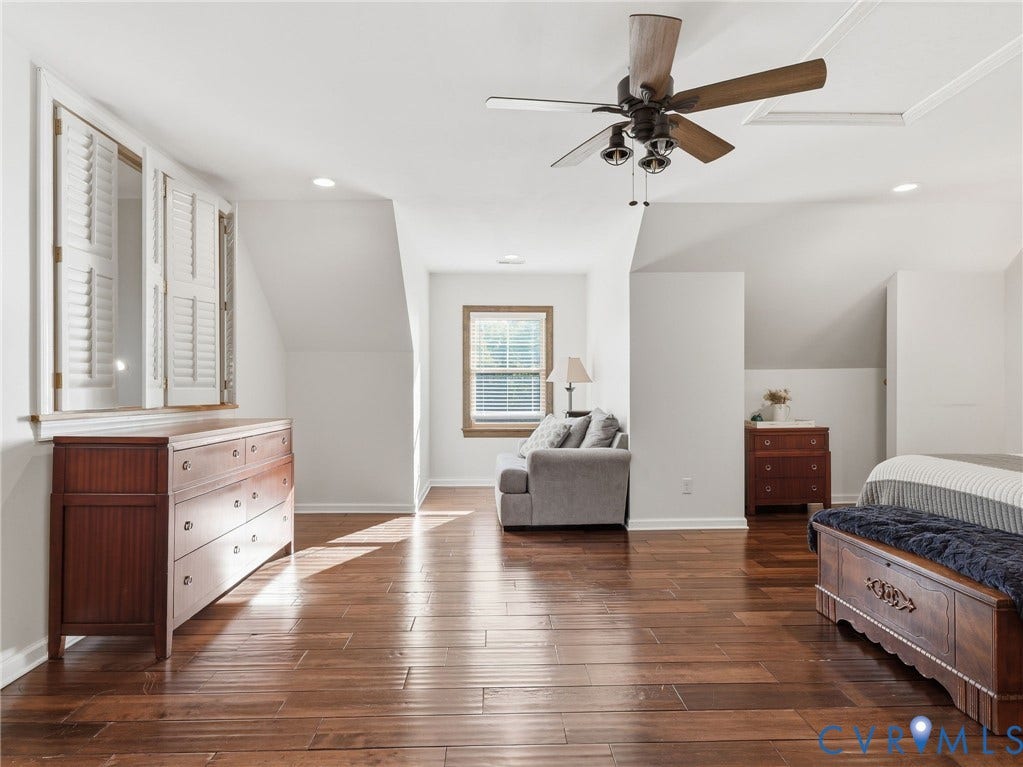 16233 Pleasant Mill Road, Montpelier, VA 23192 Wood-finish flooring, vaulted ceilings, multi-blade ceiling fan with integrated lighting, recessed lighting, and windows with interior shutters