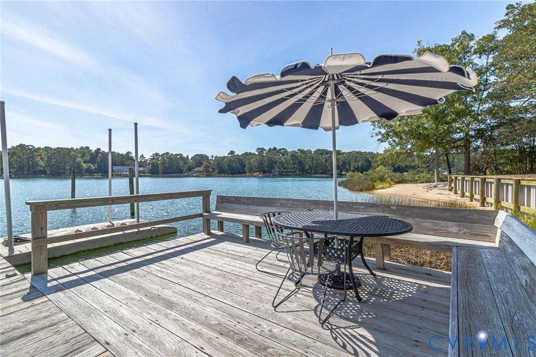 Expansive waterfront dock with mooring pilings
