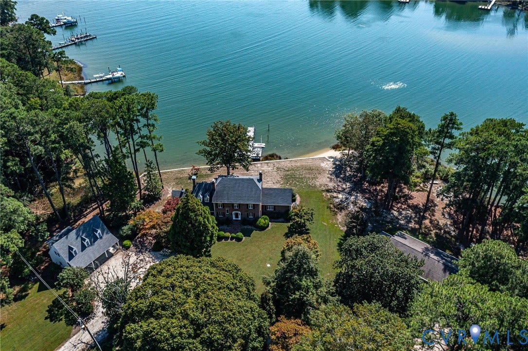 Main house, guest house and garage all with wonderful water views