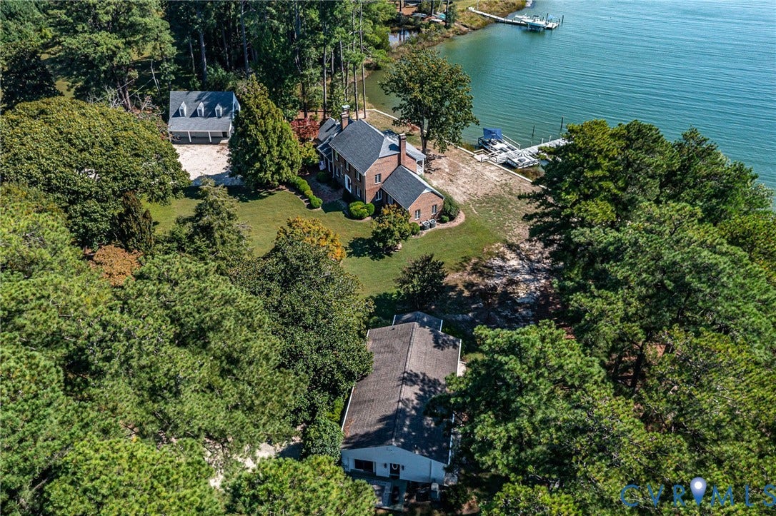 In order, 2 car garage, main house and guest cottage