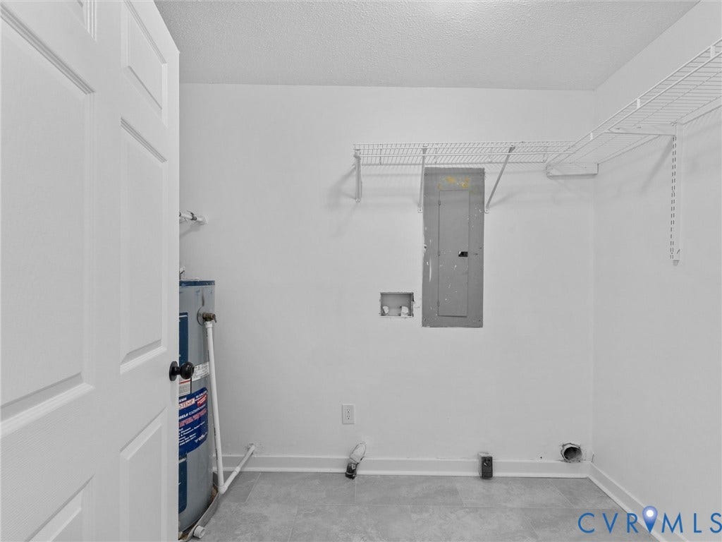 White paneled door, wire shelving, and light gray flooring