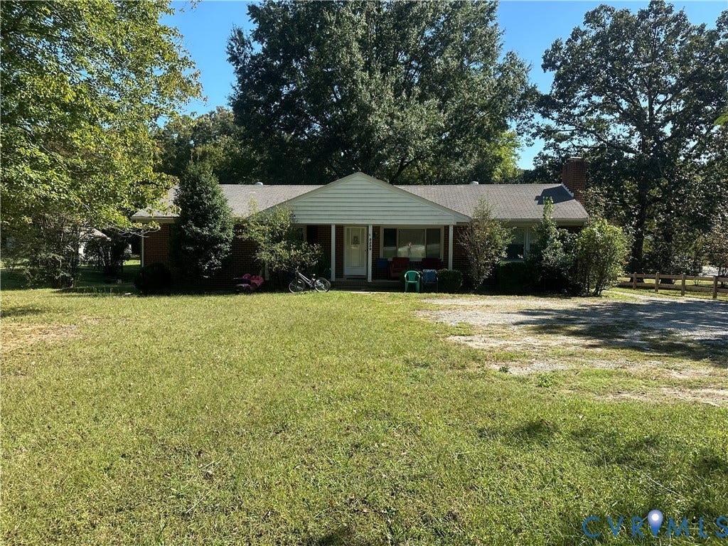 5539 Qualla Road, Chesterfield, VA 23832 Brick exterior with white siding accents and a covered porch