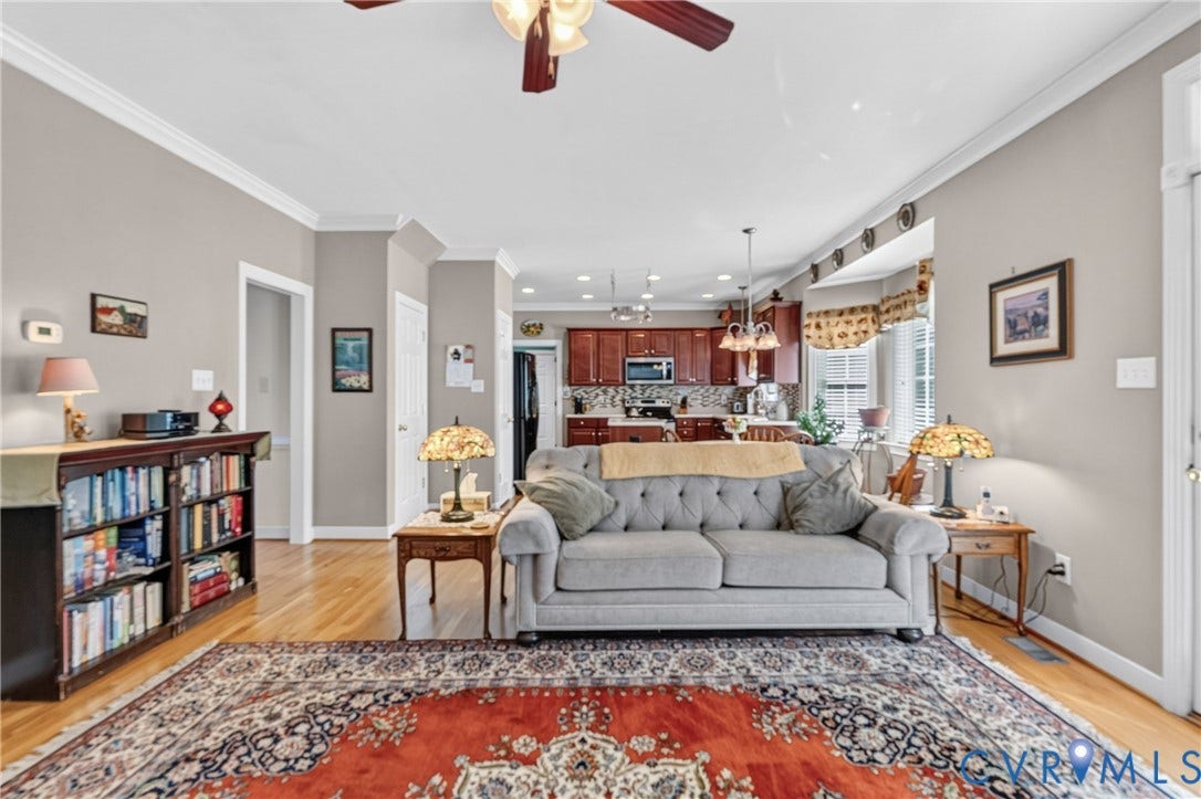 3647 Cedar Plains Road, Sandy Hook, Sandy Hook, VA 23153 Hardwood flooring, crown molding, ceiling fan, recessed lighting, and kitchen with wood cabinetry