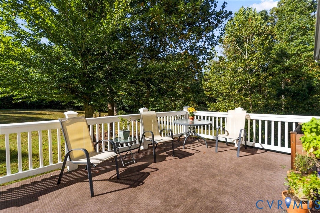 3647 Cedar Plains Road, Sandy Hook, Sandy Hook, VA 23153 Outdoor deck featuring a textured brown surface and white railings