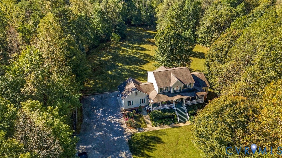 3647 Cedar Plains Road, Sandy Hook, Sandy Hook, VA 23153 Expansive property featuring a multi-story residence, wrap-around porch, and mature trees