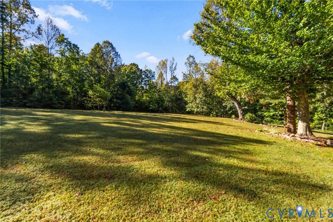3647 Cedar Plains Road, Sandy Hook, Sandy Hook, VA 23153 Expansive lawn area with mature trees and natural landscaping