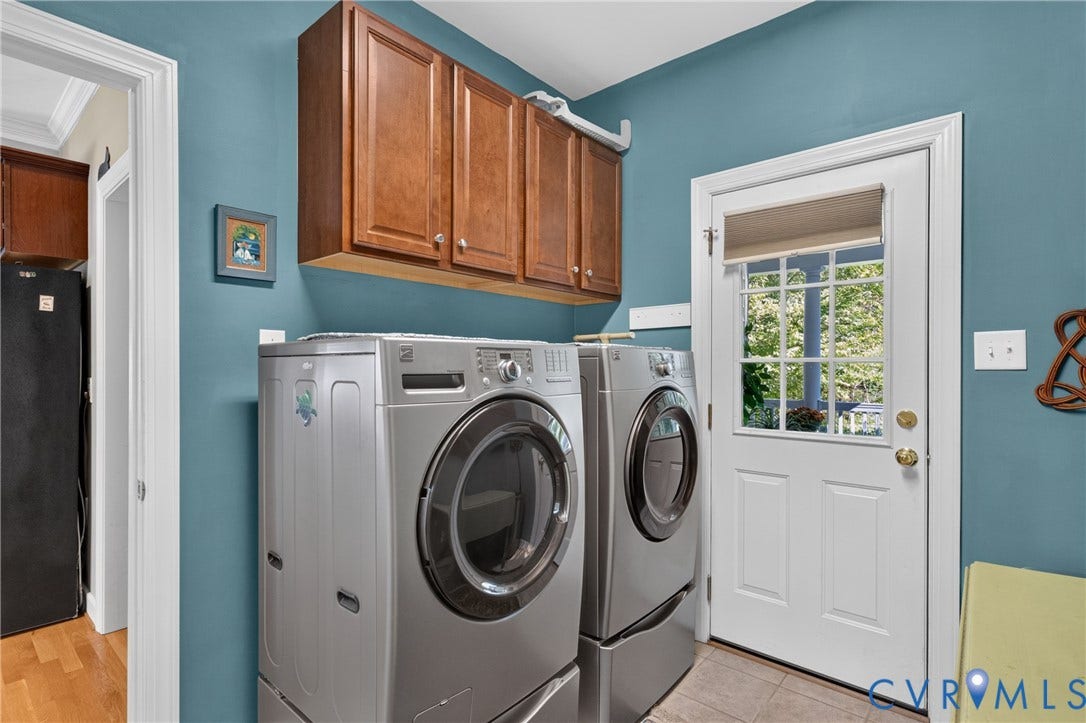 3647 Cedar Plains Road, Sandy Hook, Sandy Hook, VA 23153 Built-in cabinetry with wood-finish doors, durable flooring, and a glass-paned exterior door