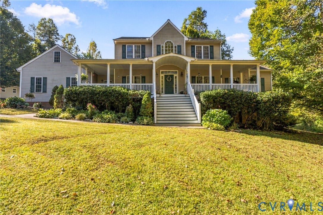 3647 Cedar Plains Road, Sandy Hook, Sandy Hook, VA 23153 Two-story residence with a covered porch, white railings, and a prominent front staircase