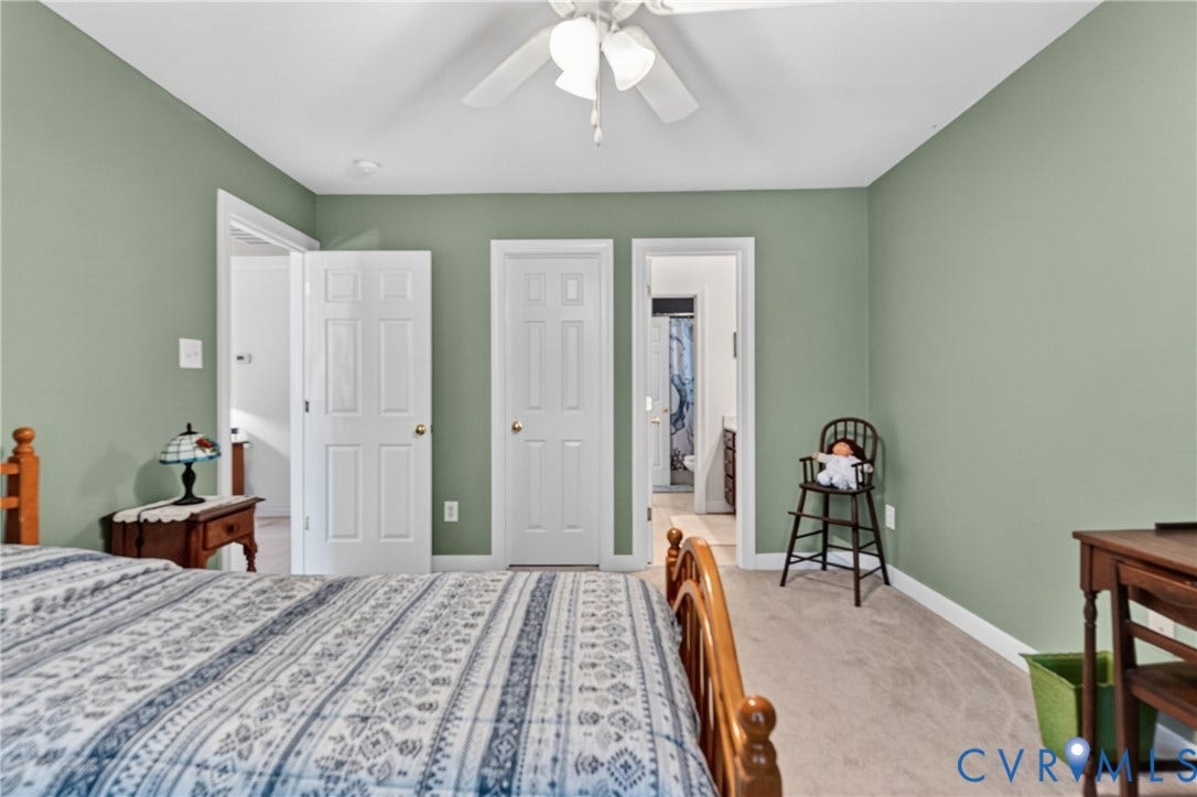 3647 Cedar Plains Road, Sandy Hook, Sandy Hook, VA 23153 Room featuring light green walls, white trim, and light-toned carpet