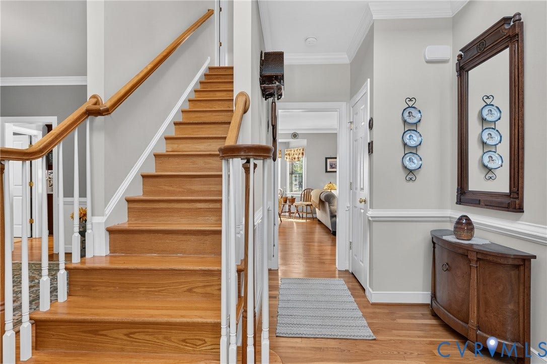 3647 Cedar Plains Road, Sandy Hook, Sandy Hook, VA 23153 Hardwood staircase with white balusters and a wood handrail